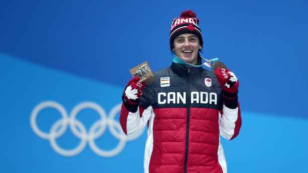 Silver medalist Mark McMorris of Canada celebrates on the podum during the Medal Ceremony for the Men's Snowboard Slopestyle on day two of the PyeongChang 2018 Winter Olympic Games at Medal Plaza on February 11, 2018 in Pyeongchang-gun, South Korea.