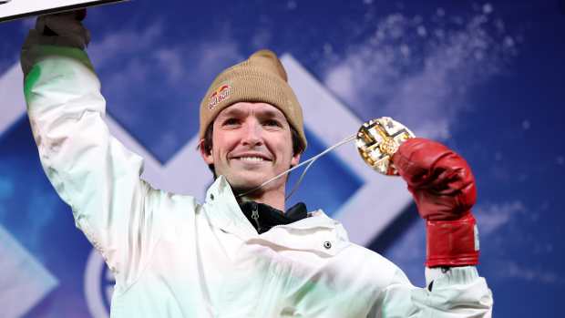Scotty James of Australia celebrates on the podium after winning the Men's Snowboard Superpipe during Day One of the X Games Aspen 2025 at Buttermilk Ski Resort on January 23, 2025 in Aspen, Colorado.