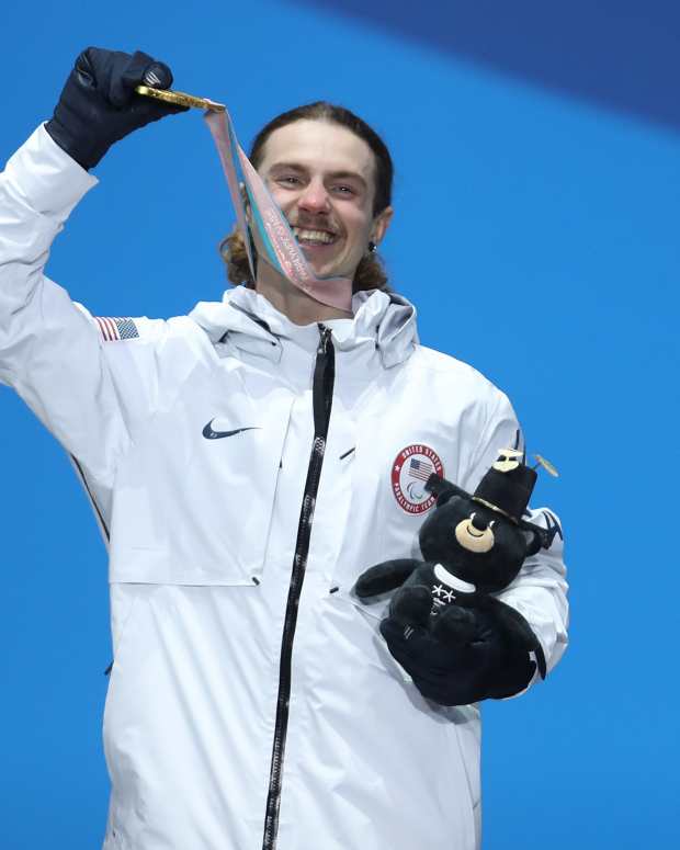 Noah Elliott of USA celebrates during the medal ceremony for the Men's Snowboard Banked Slalom SB-LL1 Final on day seven of the PyeongChang 2018 Paralympic Games on March 16, 2018 in Pyeongchang-gun, South Korea.