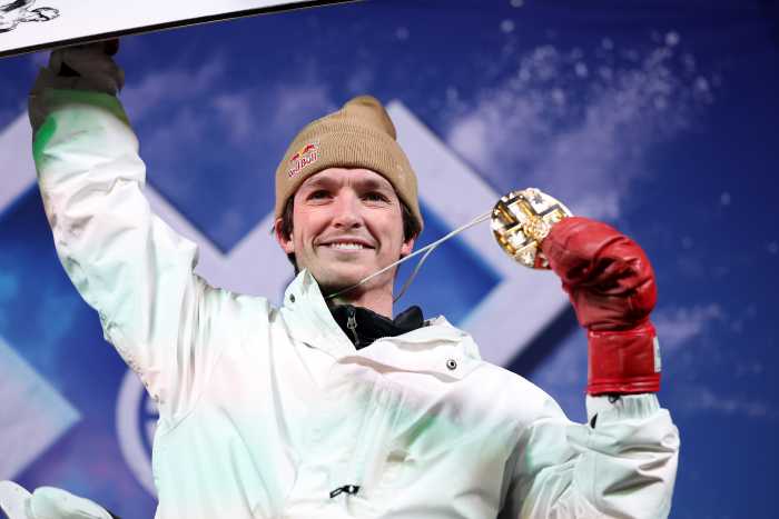 Scotty James of Australia celebrates on the podium after winning the Men's Snowboard Superpipe during Day One of the X Games Aspen 2025 at Buttermilk Ski Resort on January 23, 2025 in Aspen, Colorado.