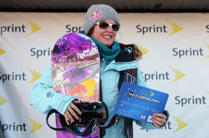 Maddy Schaffrick celebrates as she takes the podium in second place in the women's halfpipe finals of the Sprint US Snowboard Grand Prix on December 10, 2011 in Copper Mountain, Colorado.