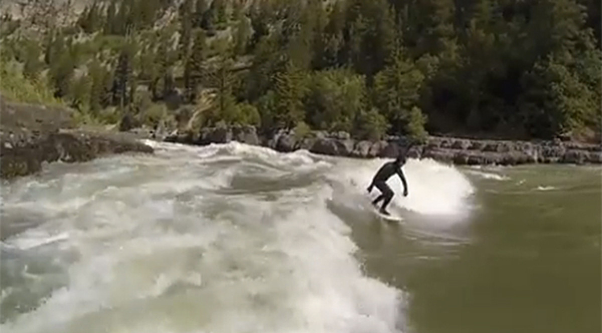Bryan Iguchi and Cam Fitzpatrick surf Jackson Hole's Snake River