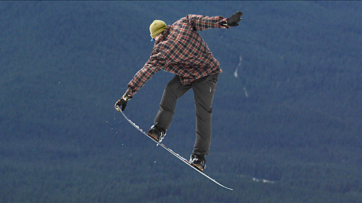 How to do a Backside Crail Grab on a Snowboard Snowboarder
