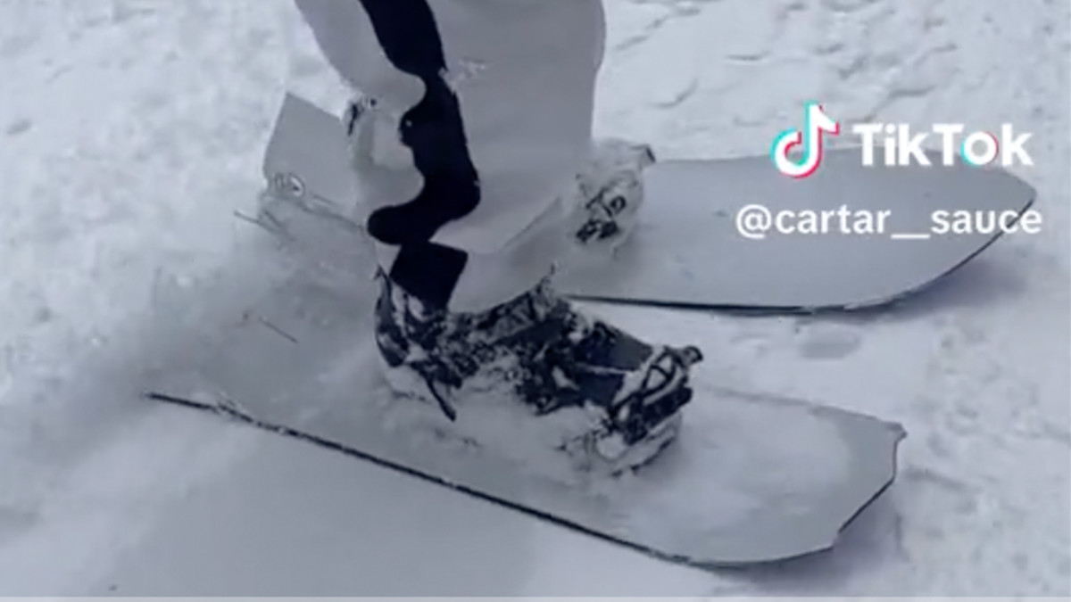 Watch Clever Rider Uses Broken Snowboard As Skis Snowboarder