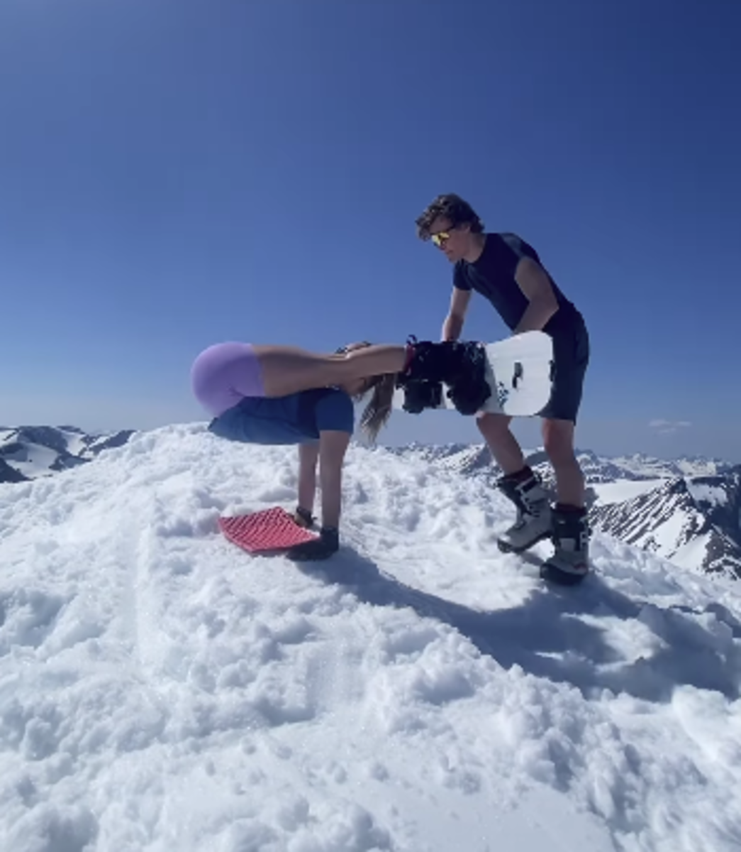 Watch The Most Extreme Snowboard Yoga We've Ever Seen Snowboarder